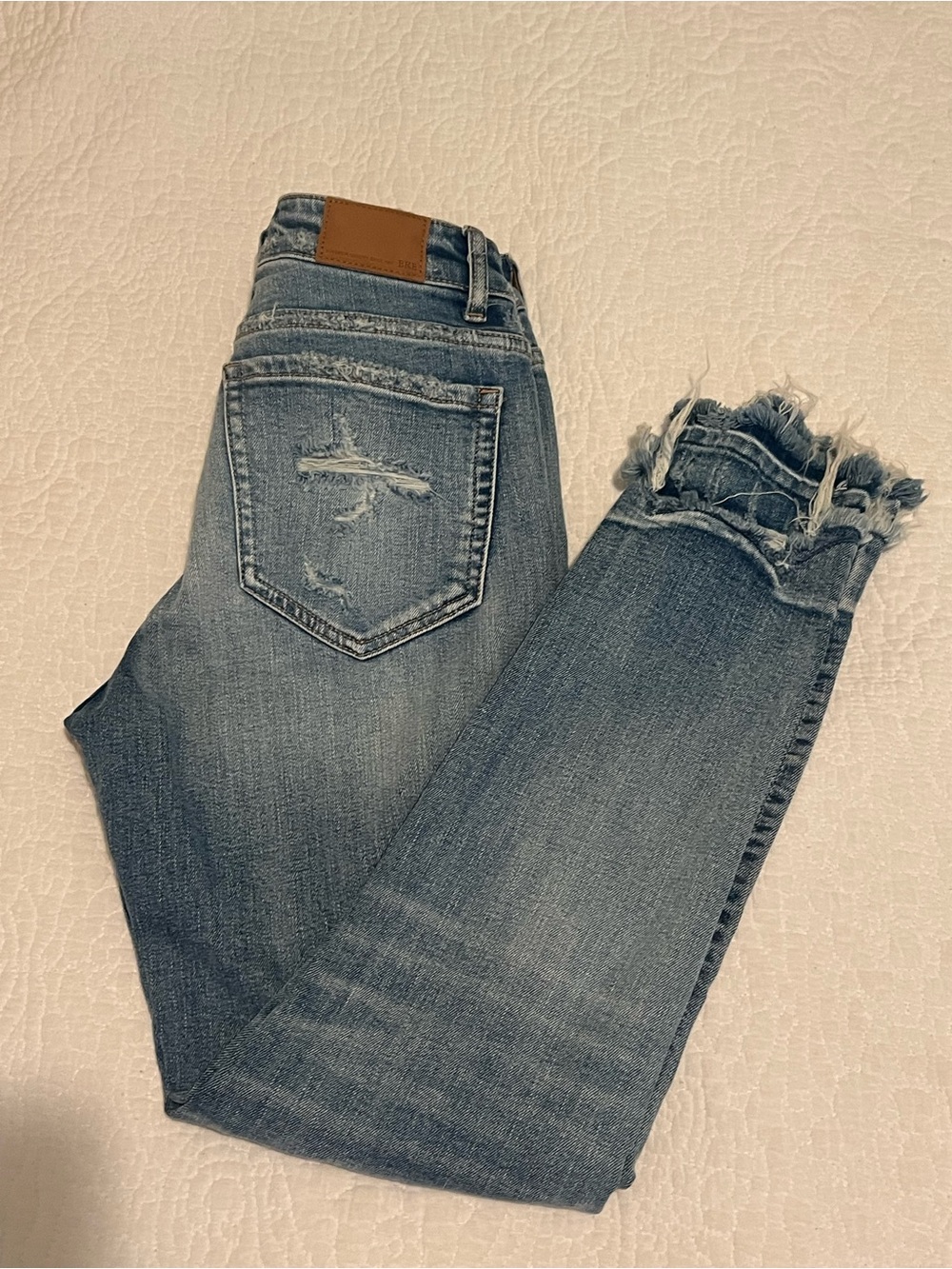 BKE Women’s Frayed Hem Distressed Blue Ankle Jeans